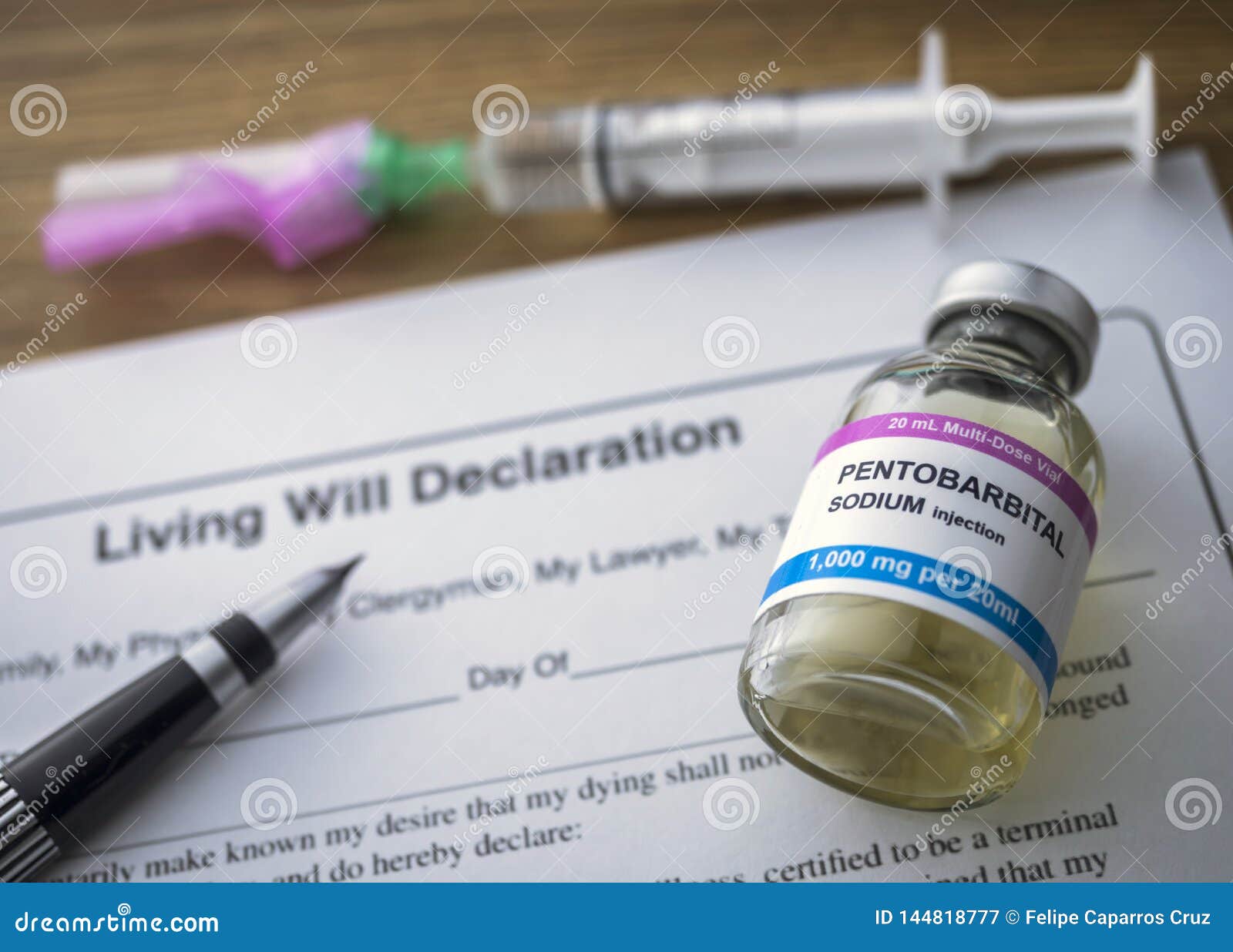living will declaration form next to a vial of pentobarbital sodium to proceed to euthanasia