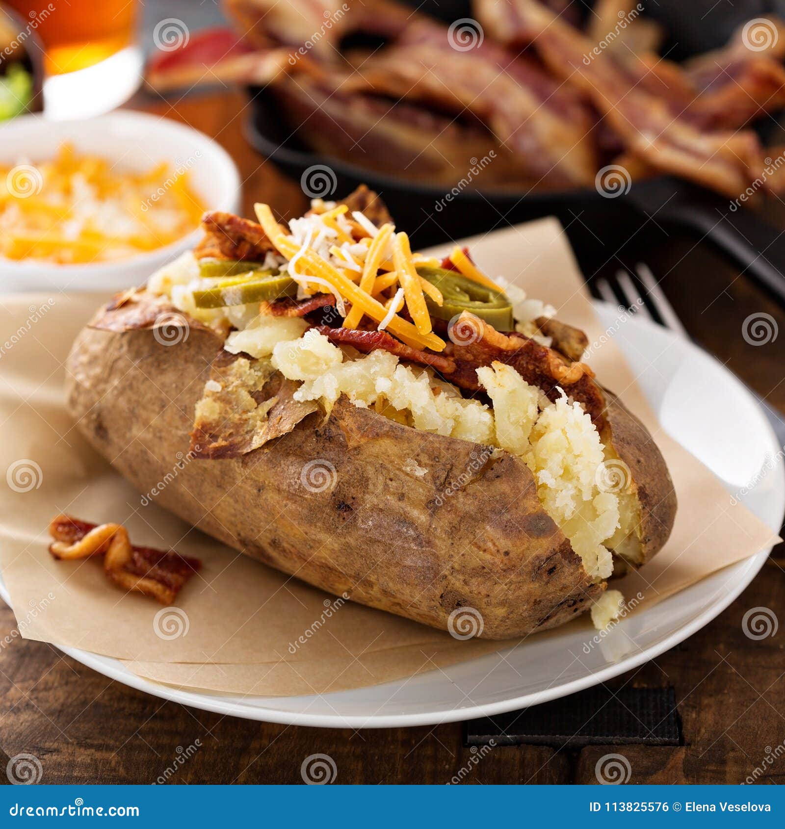 Loaded Baked Potato with Bacon and Cheese Stock Photo - Image of cheese