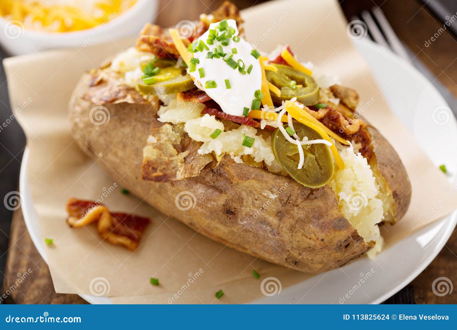 Loaded Baked Potato with Bacon and Cheese Stock Photo - Image of