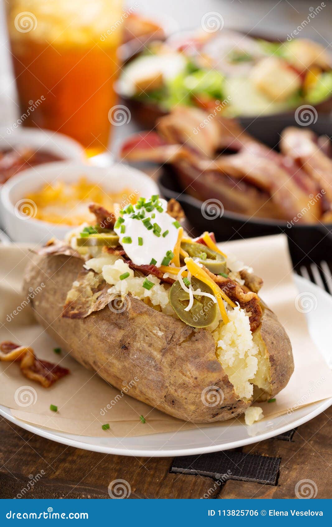 Loaded Baked Potato with Bacon and Cheese Stock Photo - Image of