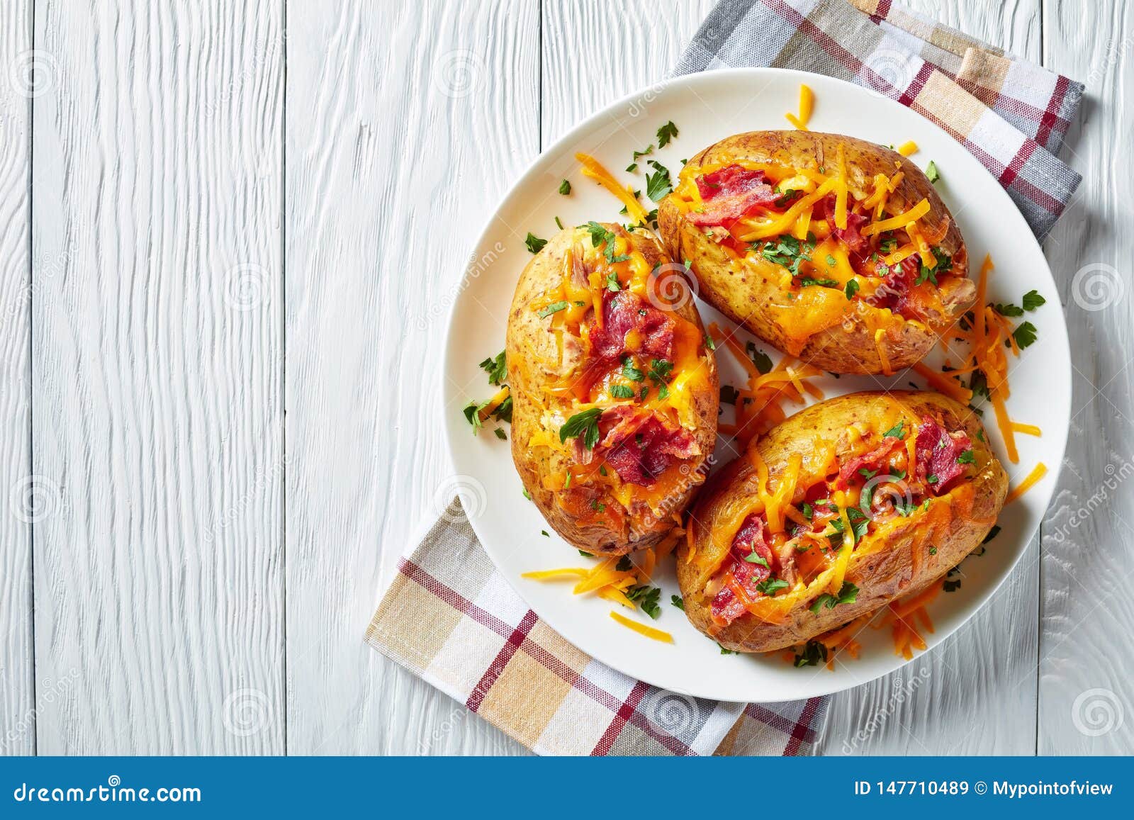 Loaded Baked Potatoes with Bacon, Cheese, Meat Stock Image - Image of