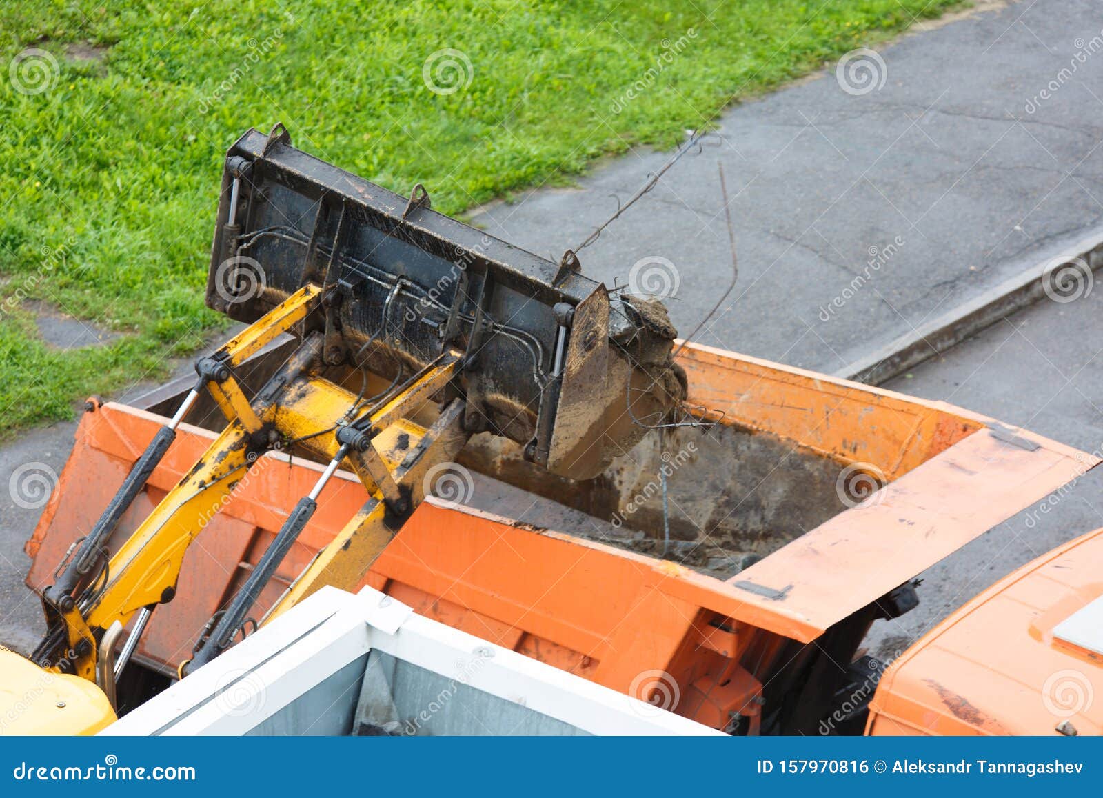 Loading Construction Debris into the Truck for Removal To the Landfill