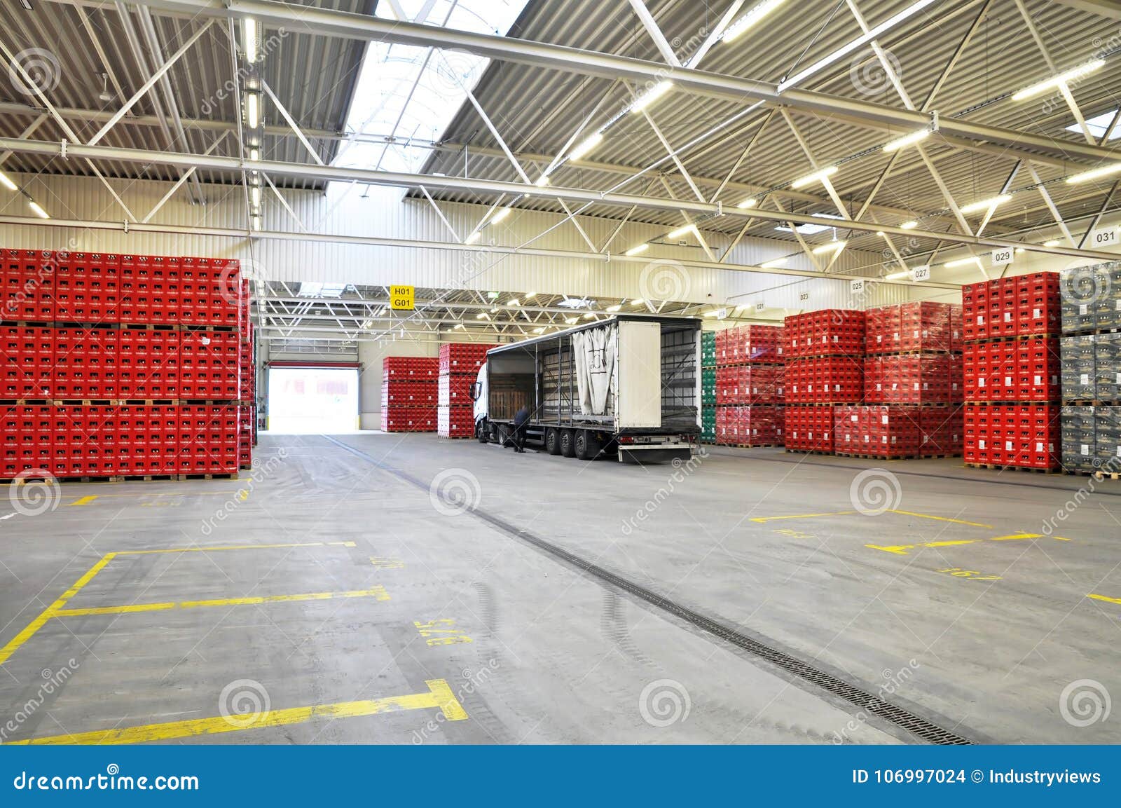 Loading of Goods in a Brewery Warehouse Beer Crates with Beer Stock