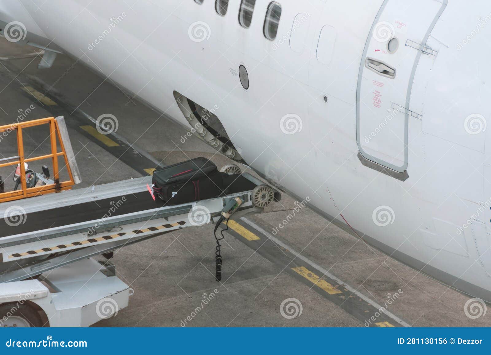 Loading of Luggage To Airplane. Suitcases on Conveyor Belt To Plane