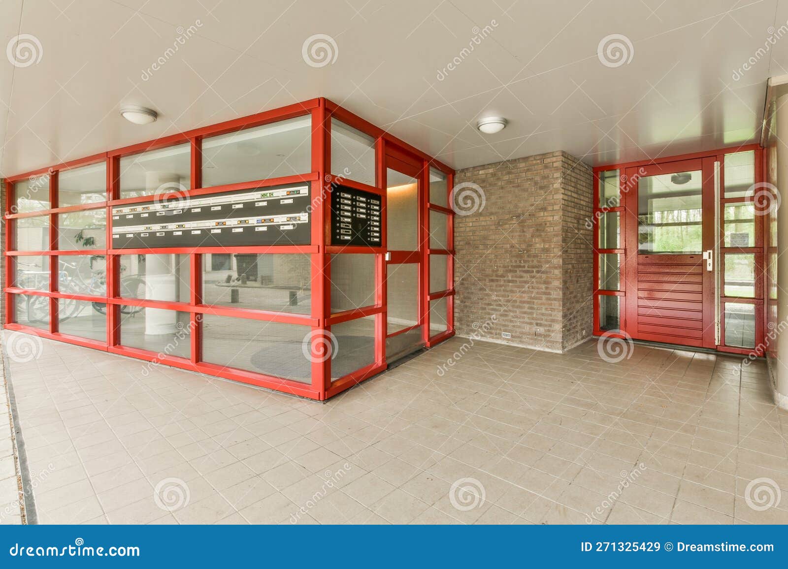 The Lobby of a Building with Red Doors and Windows Editorial Stock Image Image of wood