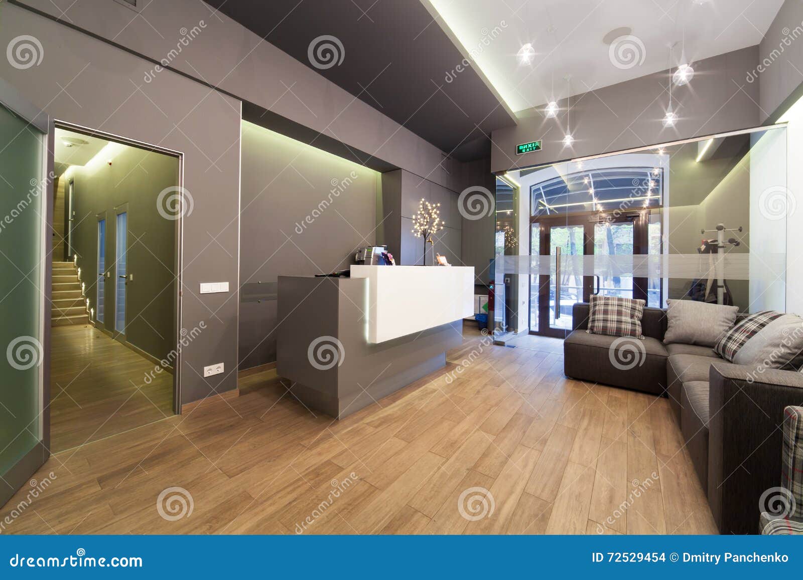 lobby entrance with reception desk in a dental clinic.