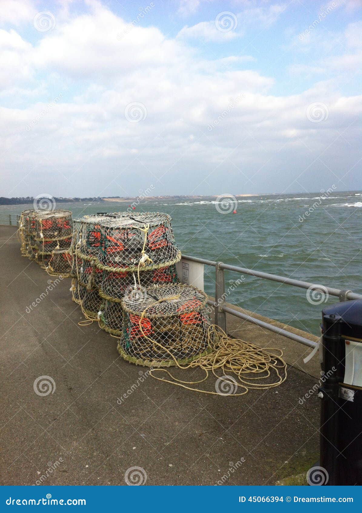 Lobster pots on sea front editorial stock image. Image of shellfish