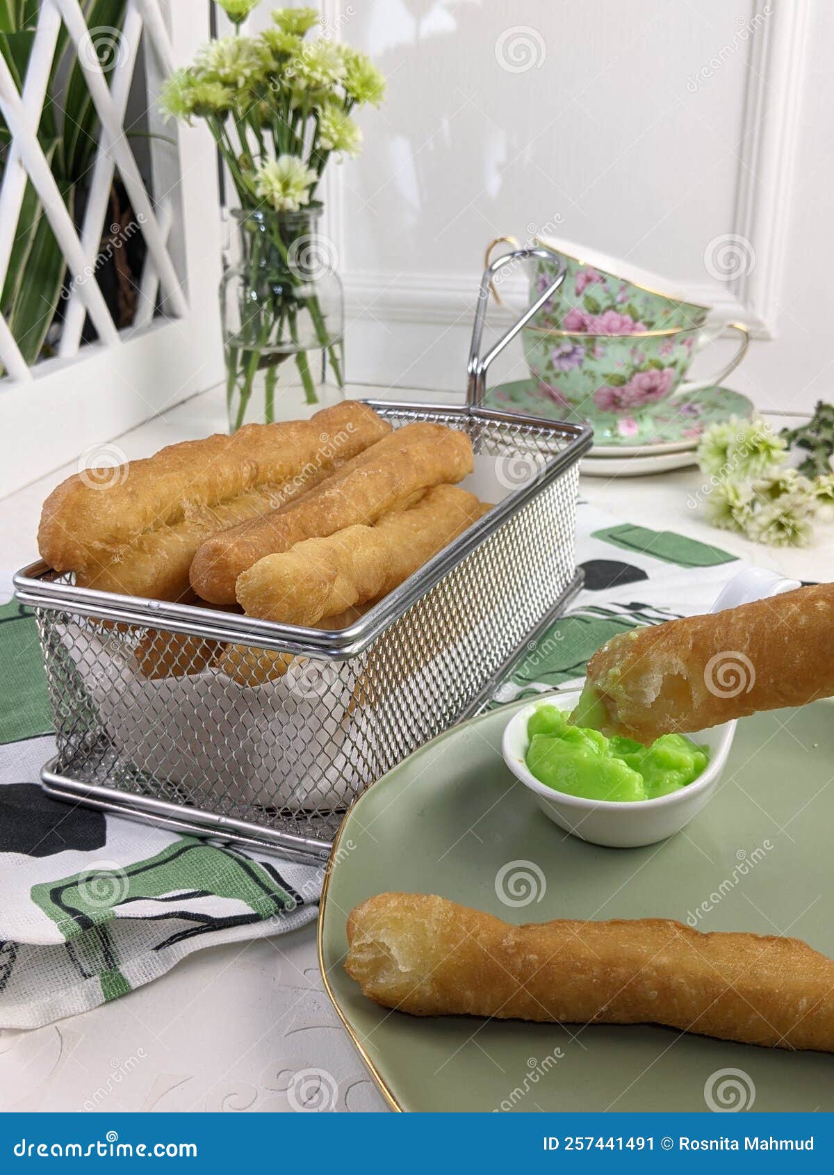 local breadstick called cakoi or youtiao a long golden brown deep fried strip of dough served for tea time