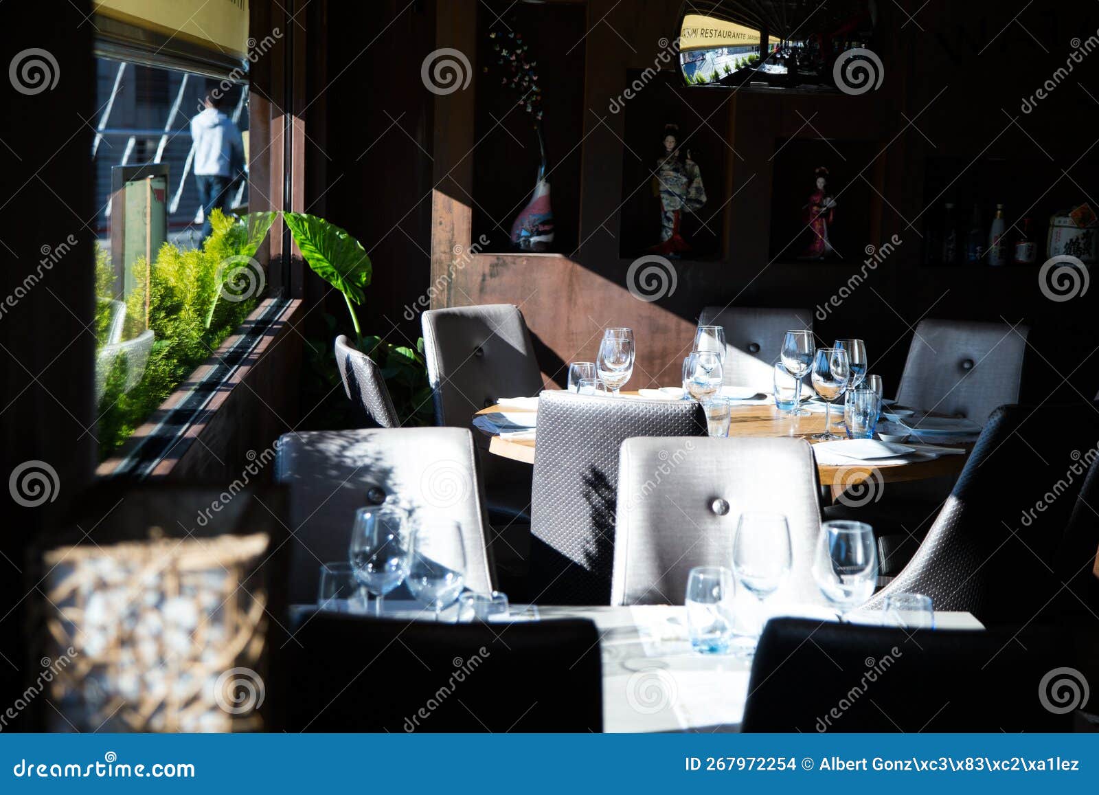 Elegant Restaurant Table with Cutlery, Crockery and Glasses. Stock