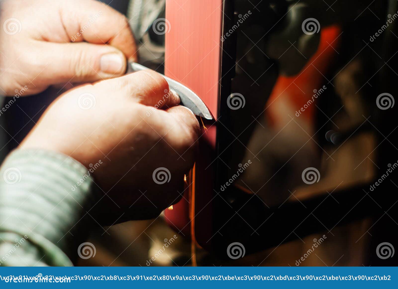 Locksmith Hands Using Pick Tools To Open Locked Door Stock Image