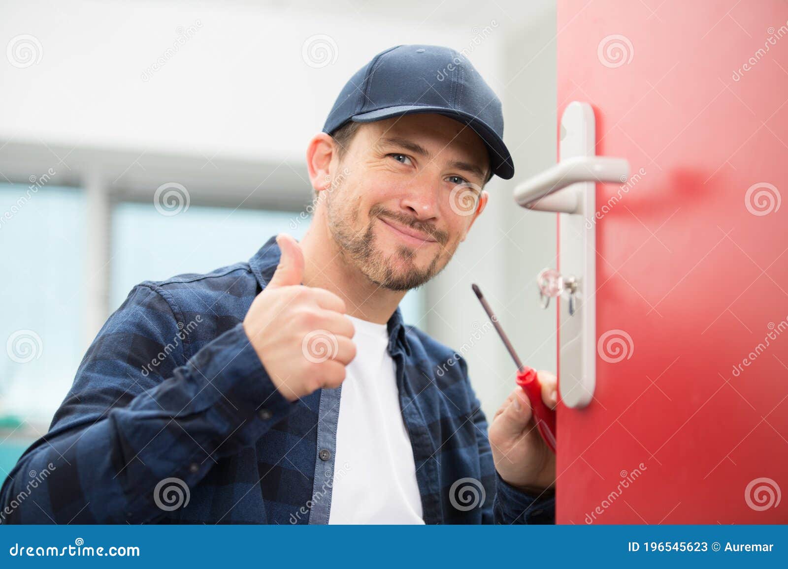 Locksmith with Screwdriver Holding Thumbs Up Stock Image Image of