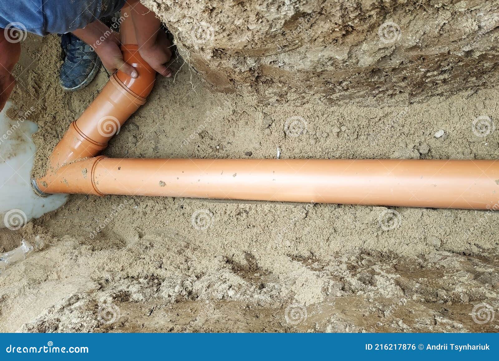 A Locksmith Supplies a Sewer Pipe To the Sump Stock Photo Image of