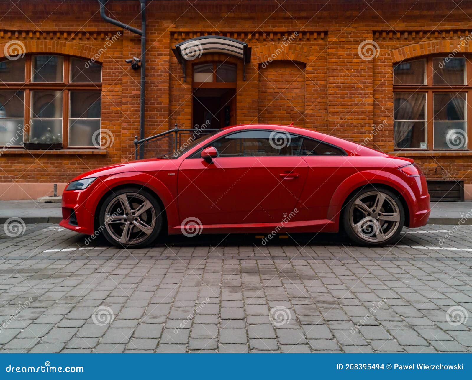 Red Audi TT in Front of Small Red Brick Building Stock Image - of design, automotive: 208395494