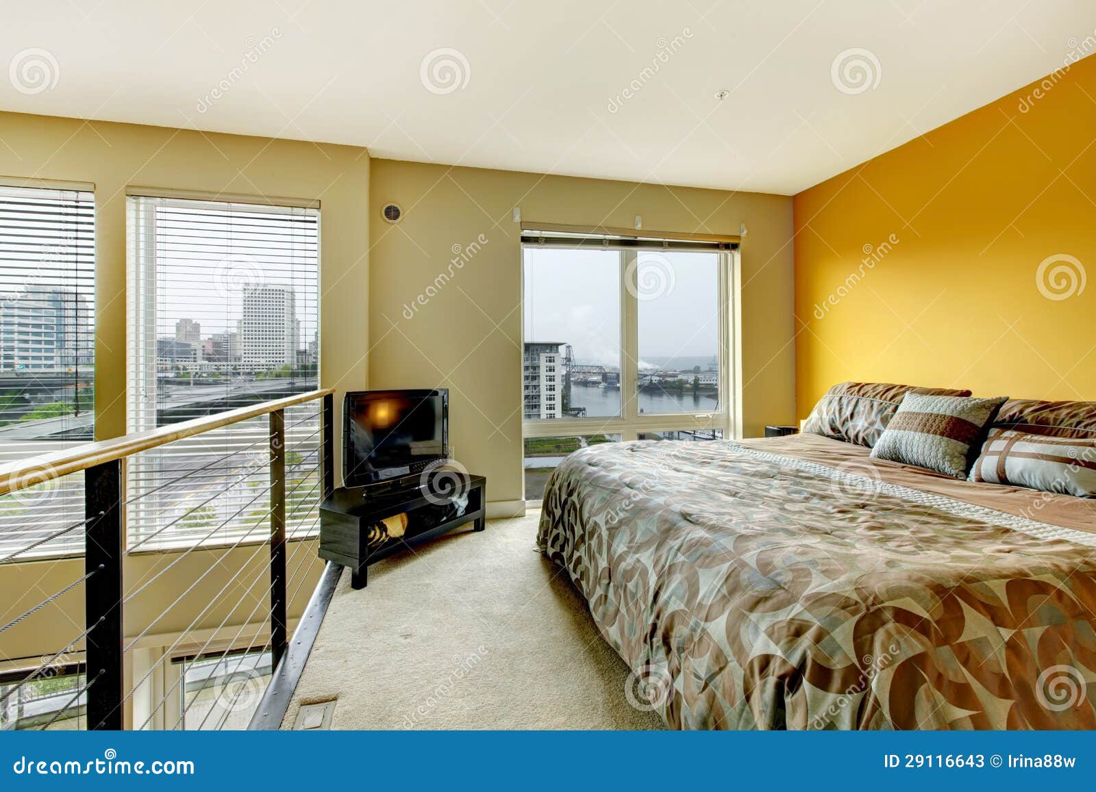 Loft Apartment Bedroom with Railing and TV. Stock Image Image of