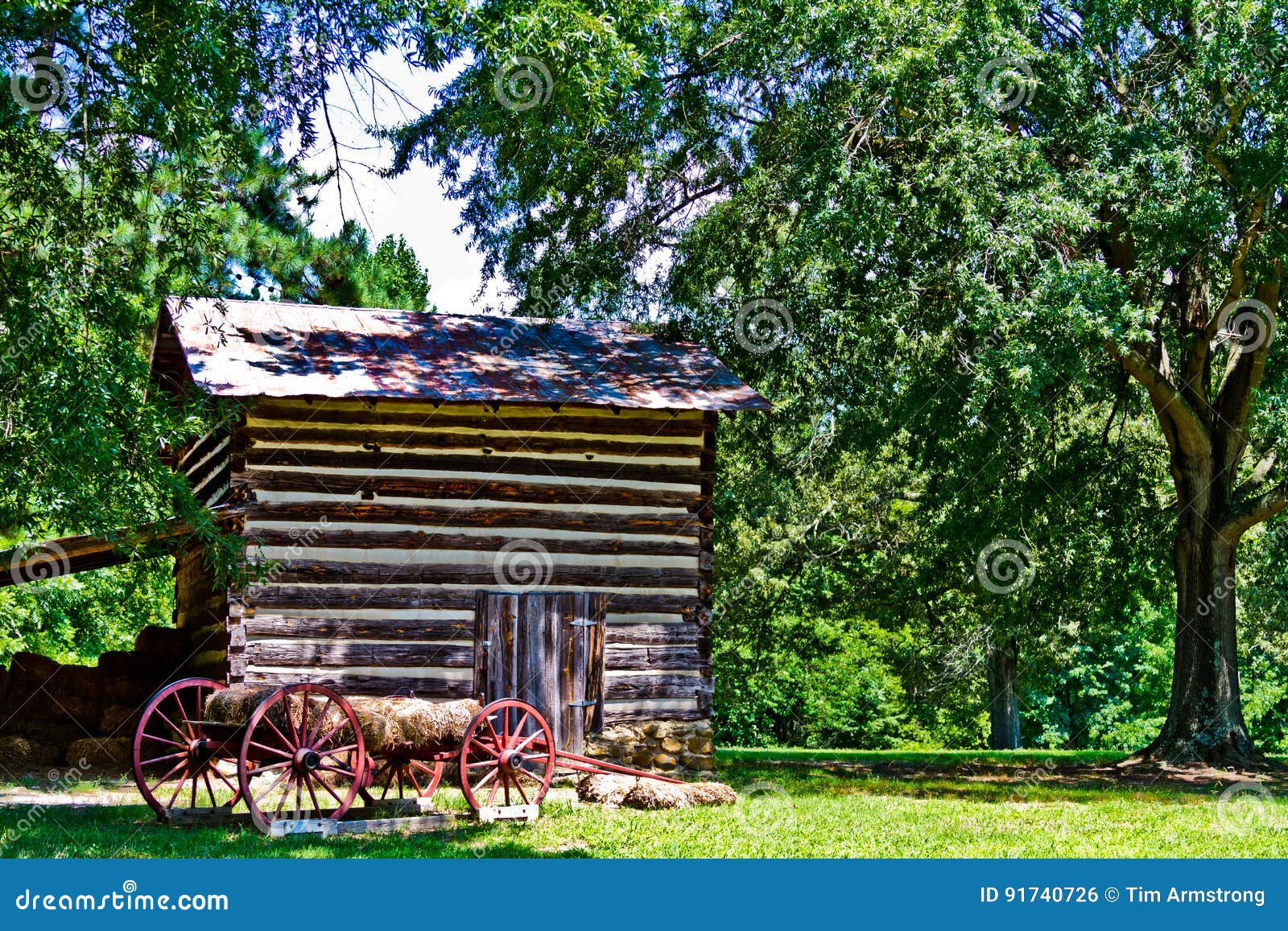 log cabin with wagon in hagan-stone park