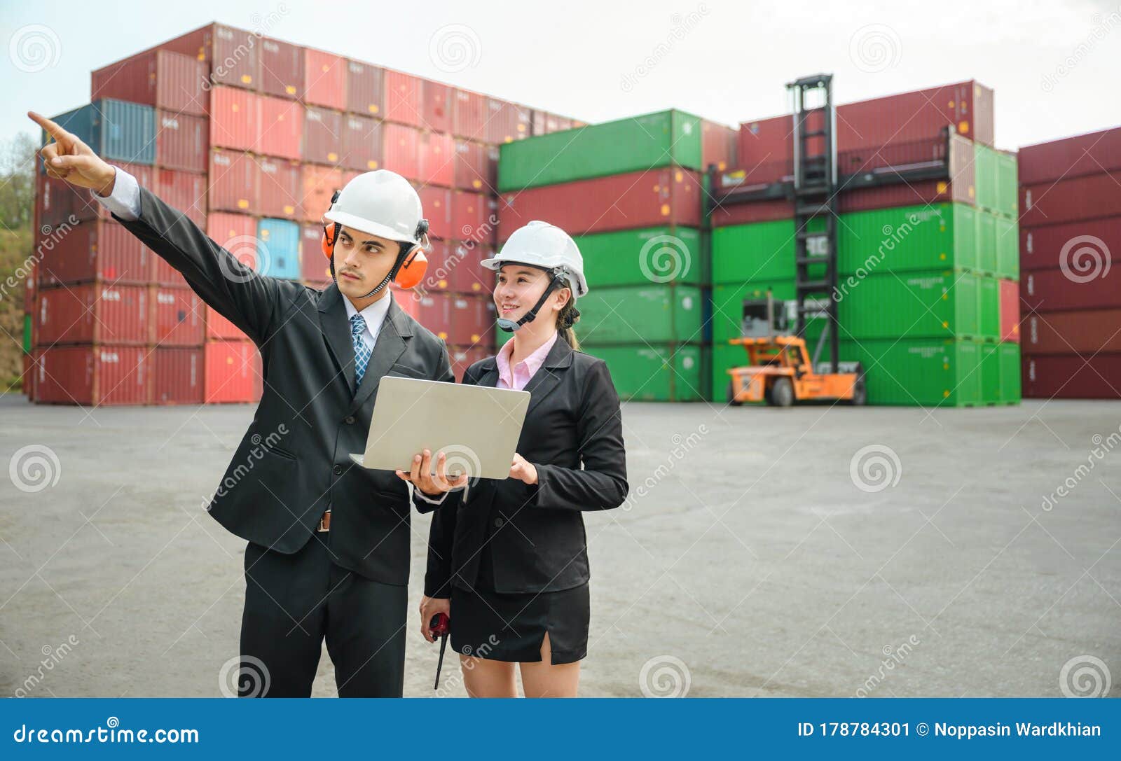 Logistics Engineer Control at the Port, Loading Containers for Trucks