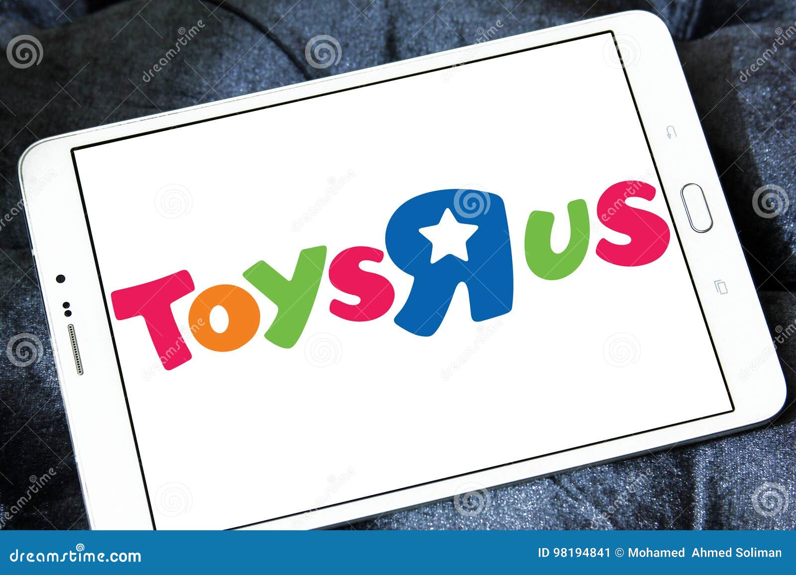 Logo för Toys R Us ungelager. Logo av det Toys R Us ungelagret på den samsung minnestavlan ` för leksak` R oss, Inc är en amerikansk leksak- och tonåring-produkter återförsäljare det är det leda ungelagret för alla leksaker, videospel, dockor, handlingdiagram som lär lekar, byggnadskvarter och mer