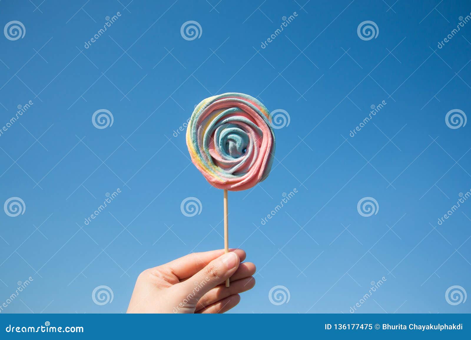 Lollipop Candy On Blue Sky Background Stock Image - Image of dessert ...