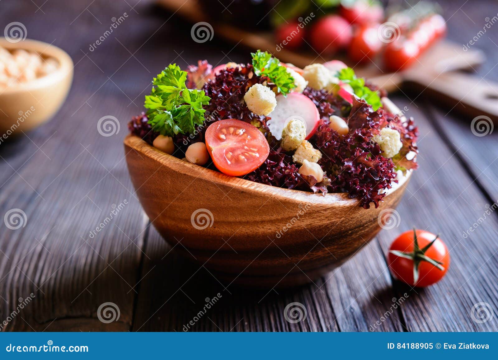 lollo rosso salad with chickpeas, tomato, radish and croutons