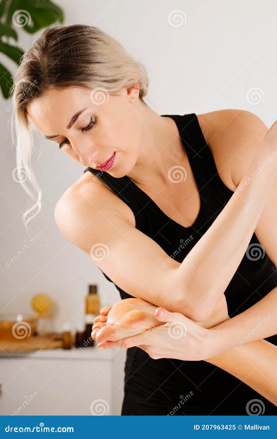 Lomi Lomi for Feet and Legs Stock Image - Image of female, lying: 207963425