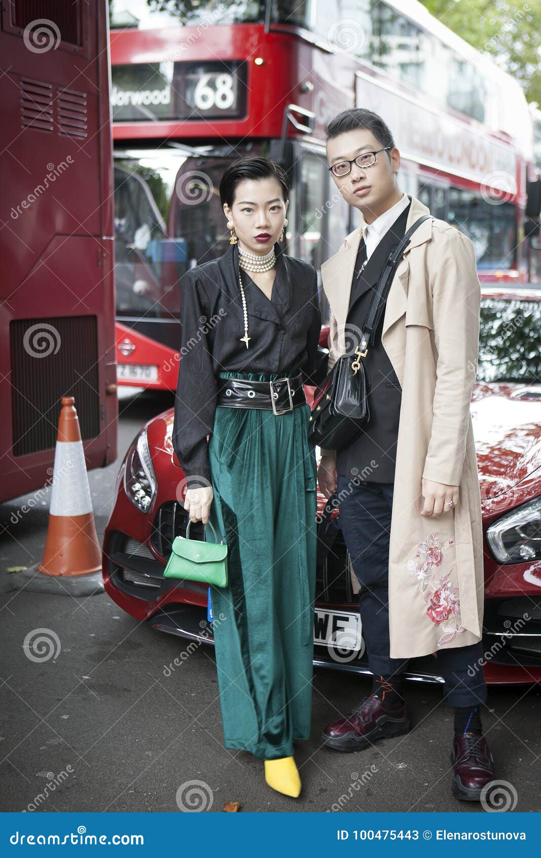 Beautiful and Stylish a Girl in a Black Blouse, a Green Pants, Vintage  Chanel Earrings Posing during the London Fashion Week. Out Editorial Stock  Photo - Image of outside, lfw17: 100475443