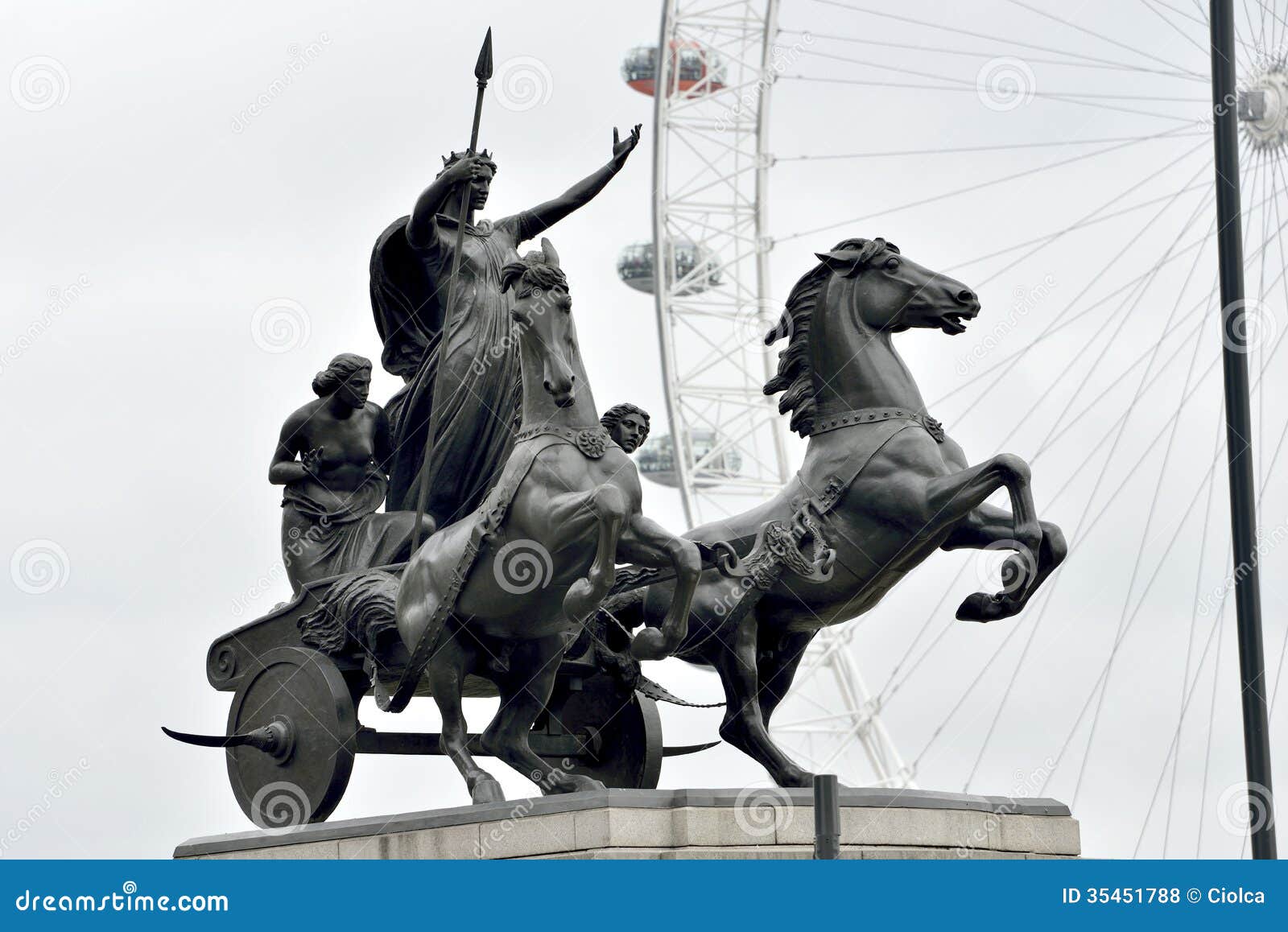 Statue of Boadicea Boudicca Queen of the Iceni (who died AD 61 after leading her people against the Roman invader in UK) in front of the London Eye