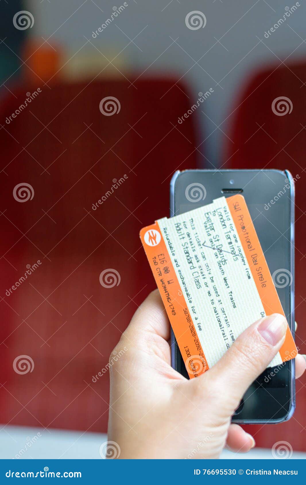 London, UK - 31 August 2016: Woman S Hand Holds a Train Ticket and a  Smartphone Editorial Image - Image of editorial, hold: 76695530