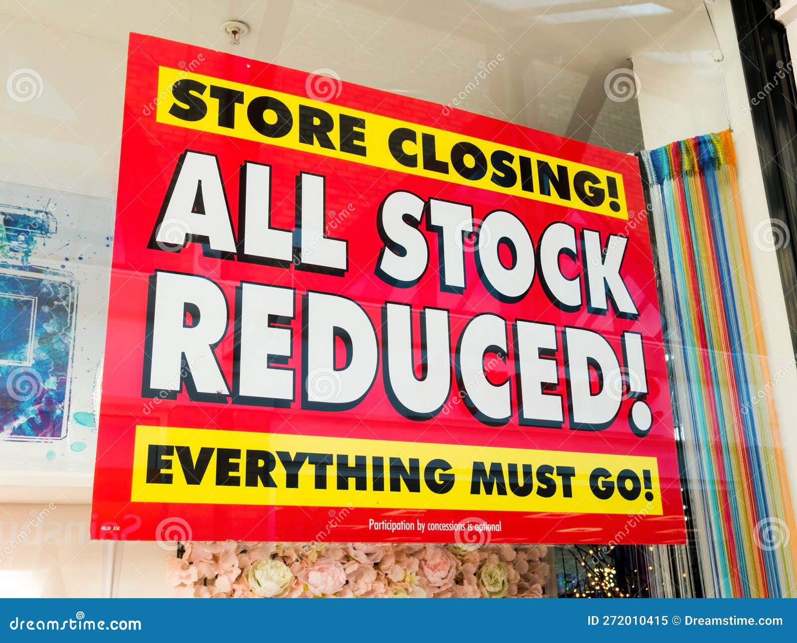 A Store Closing Poster in the Front Shop Window. Editorial Image