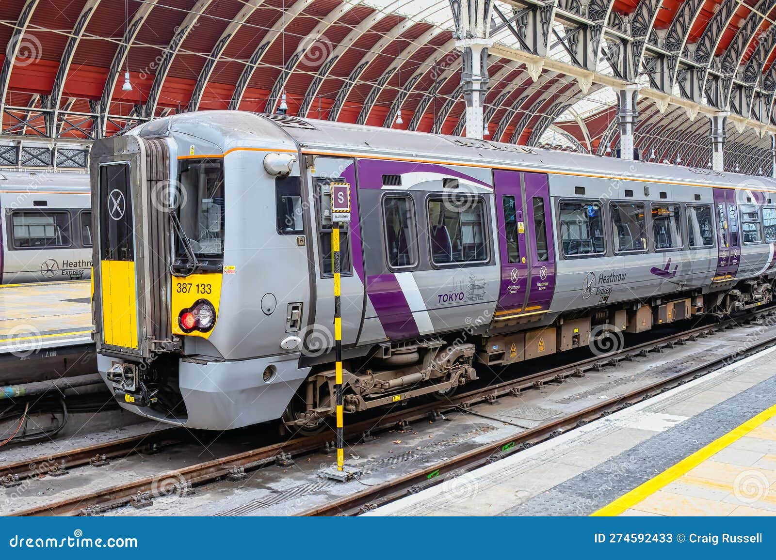 Heathrow Express Train at a Platform at Paddington Editorial Stock