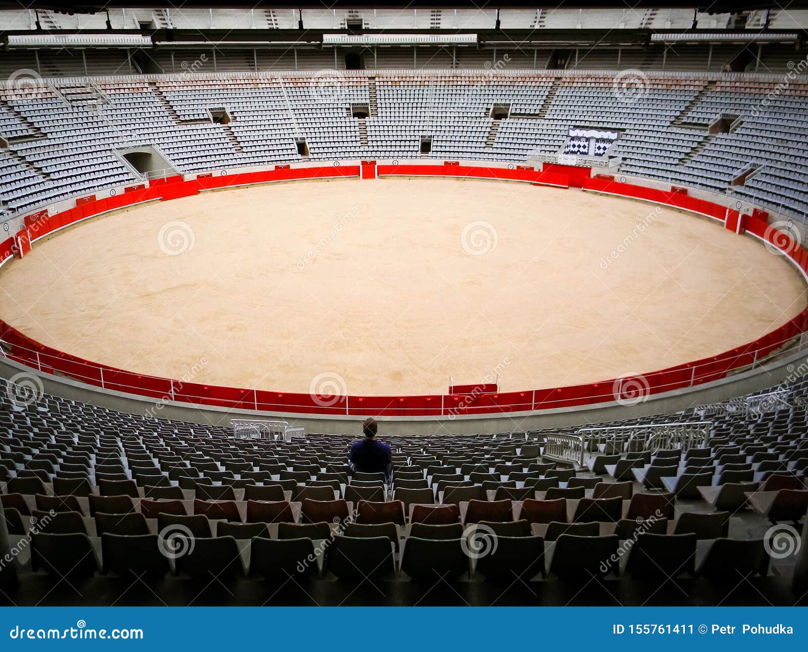 Lone Visitor Sitting in Empty Bullfighting Arena in Spain. Spanish Corrida, Traditional Cultural Event Stock Image - Image of concept, competition: 155761411 Lone Visitor Sitting in Empty Bullfighting Arena in Spain. Spanish Corrida, Traditional Cultural Event Stock Image - Image of concept, competition: 155761411