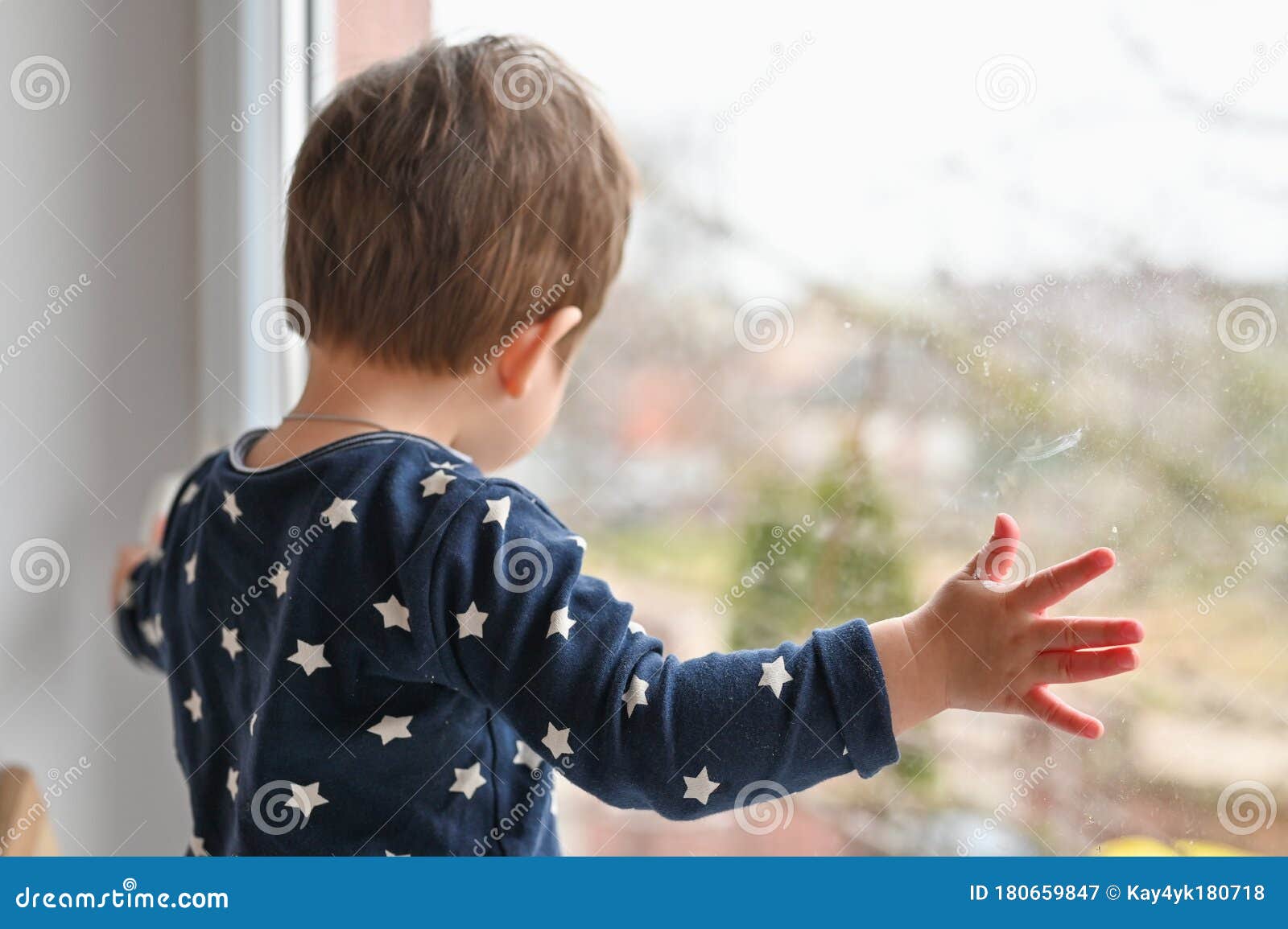Lonely Child by the Window. Sad Lonely Child Sitting Alone on the ...