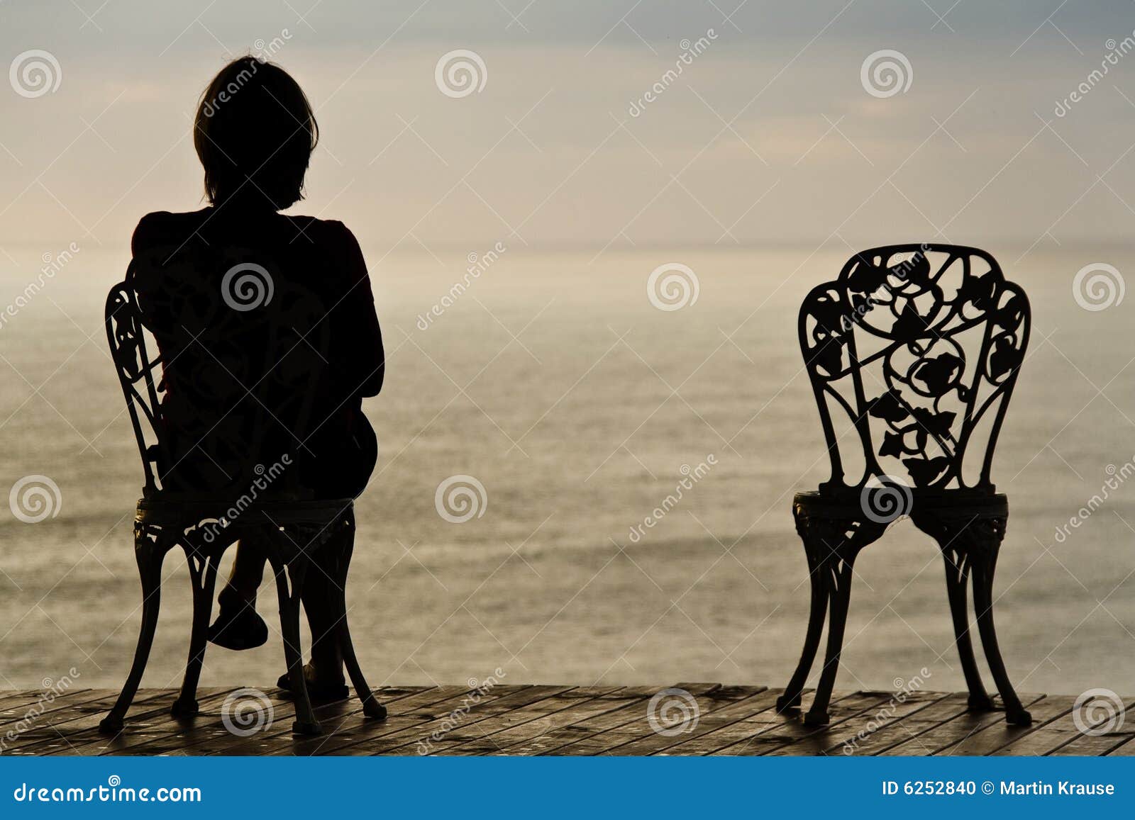 Lonely girl on a chair stock photo. Image of destination - 6252840