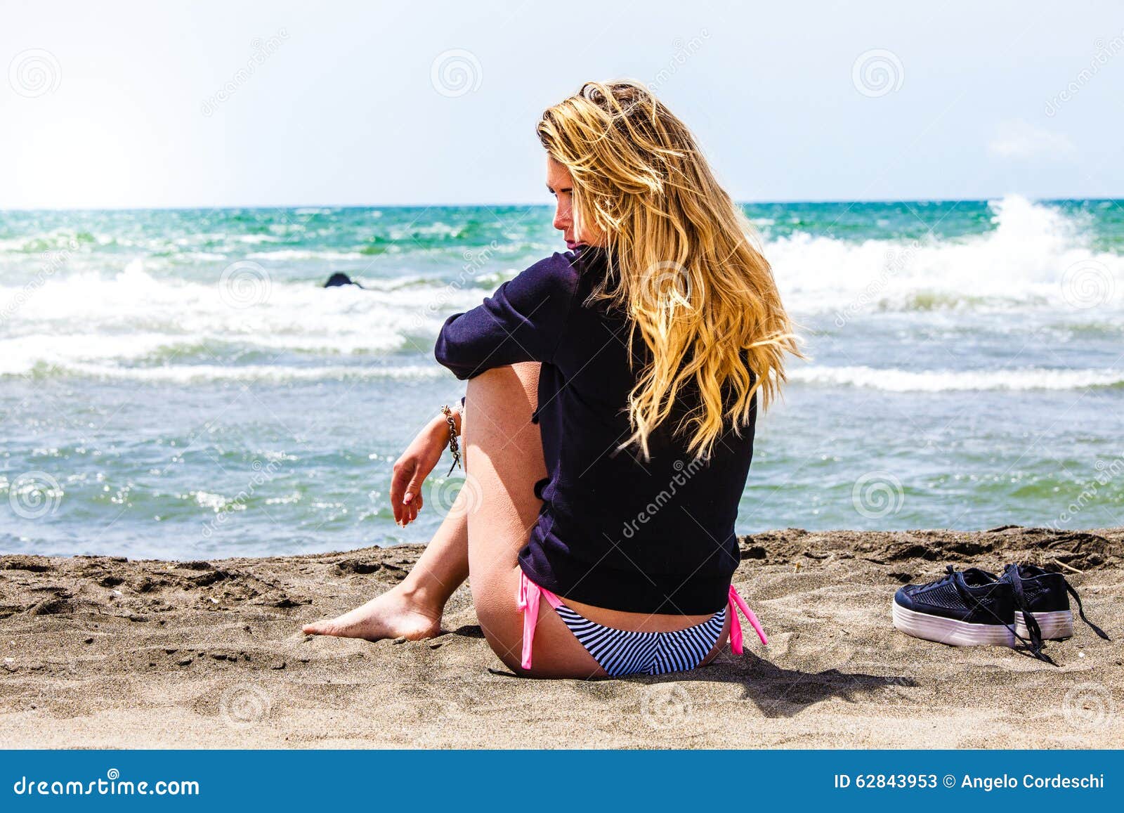Lonely Girl Sitting at the Beach with Sea. Thoughtful and Loving ...