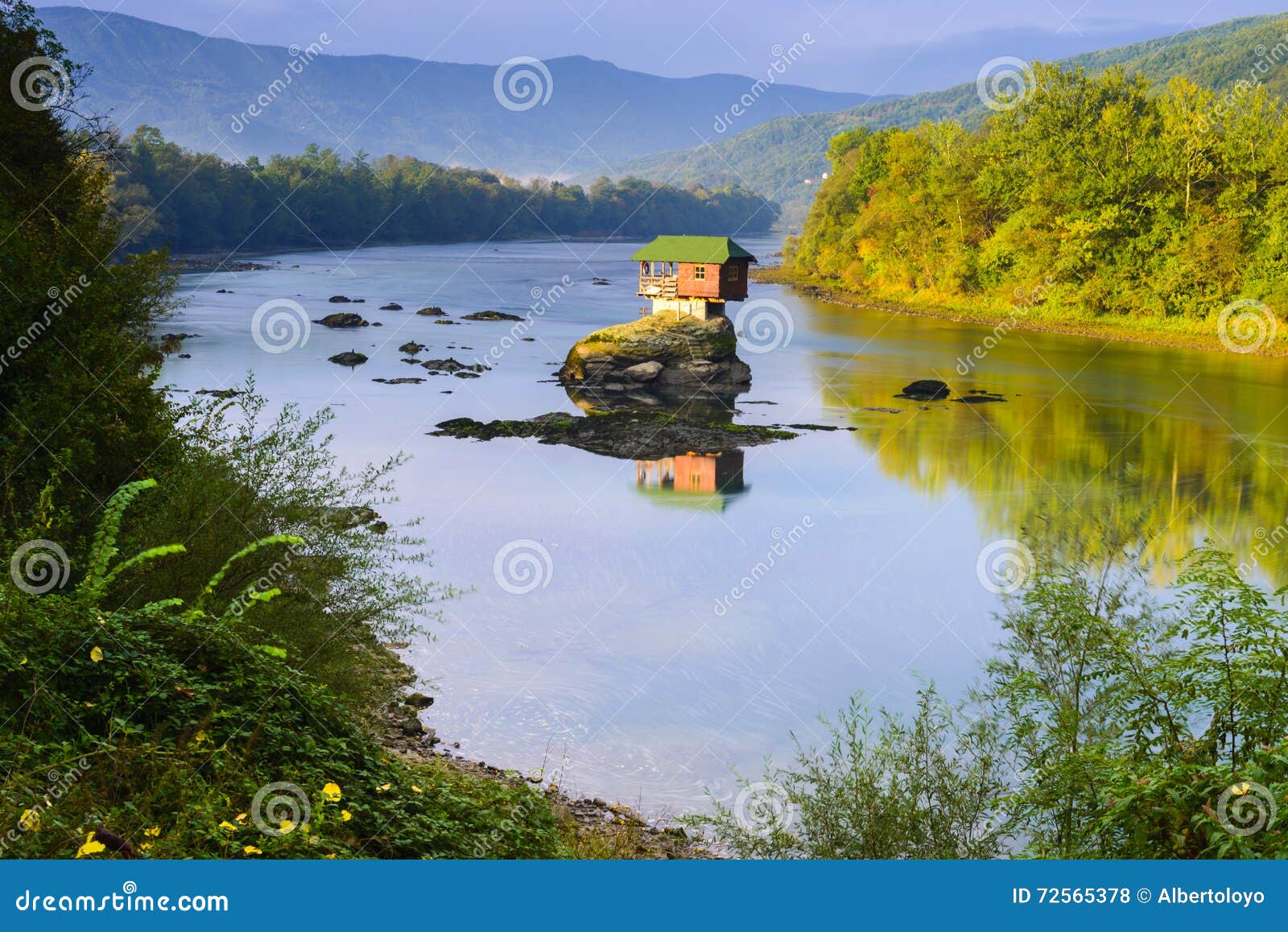 lonely house on the river drina in bajina basta, serbia