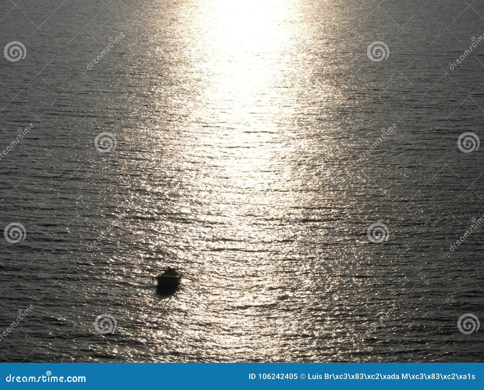 so lonely in life and ocean. sunlight on water.