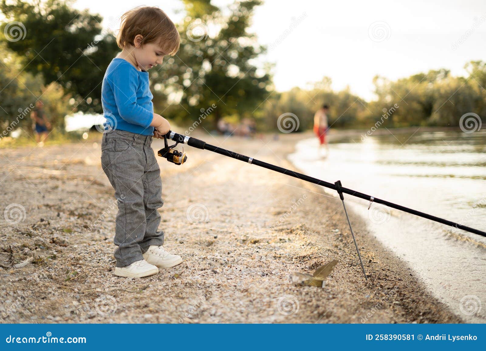 Lonely Little Child Fishing with Fishing Rod on Lake, Kid Learning