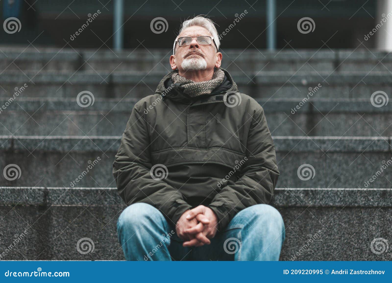a lonely man calls to god. the older man has hope and thoughts. stress and despair in adulthood