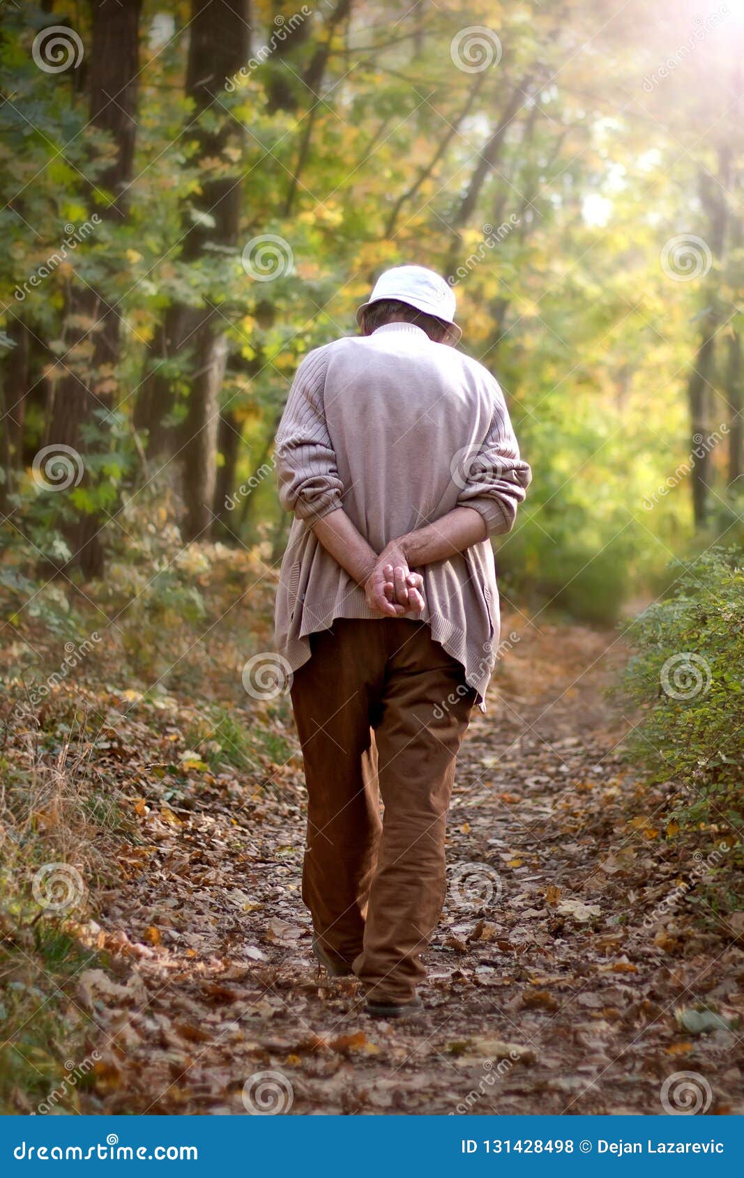 Lonely Old Man Walking in the Park. Stock Photo Image of stress
