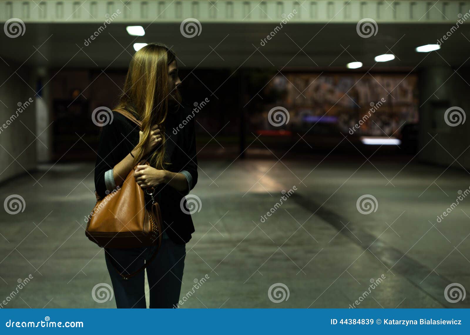 lonely woman in the underpass