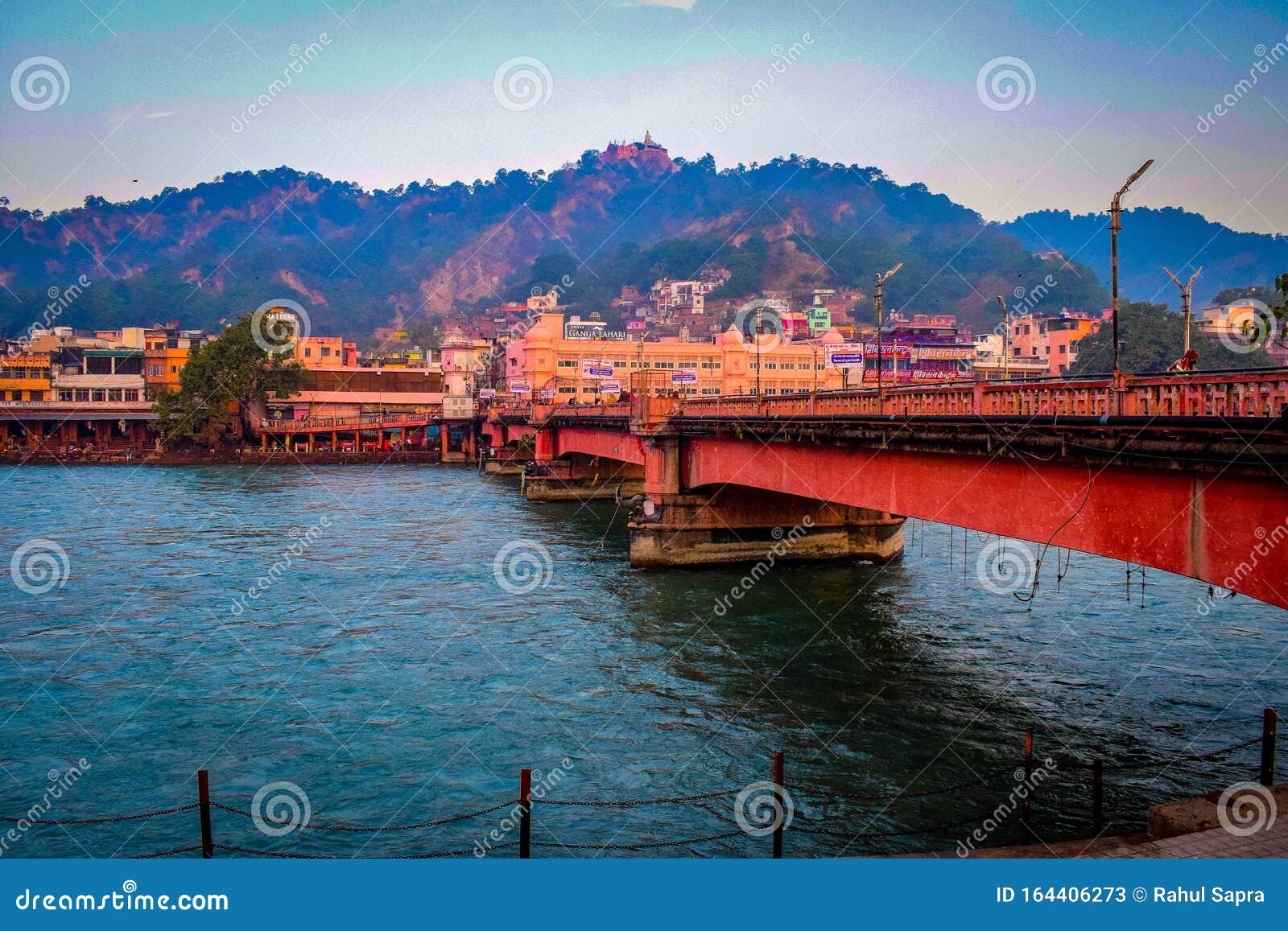 long bridge over the ganga river during morning time in haridwar india