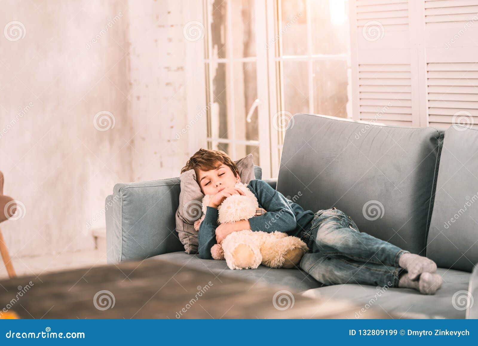 Dream close. Kids Sleep on the Couch. Boy is sleeping on the Sofa. Boy is sleeping in Armchair. A child sleeping at Home.