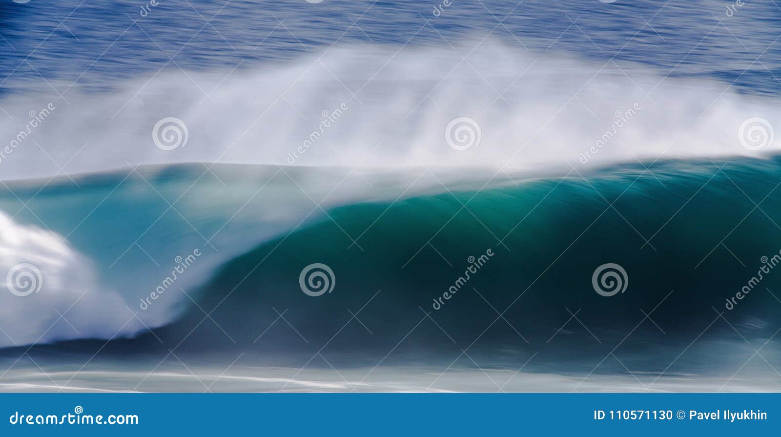 long exposure image of blue ocean big mavericks wave, california