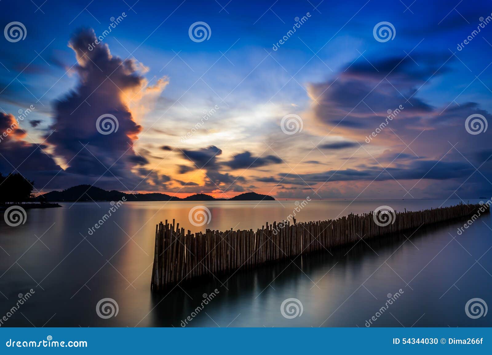 Long exposure of sunrise in Phuket, Thailand. Long exposure of magic colorful sunrise at Saphan Hin, Phuket, Thailand