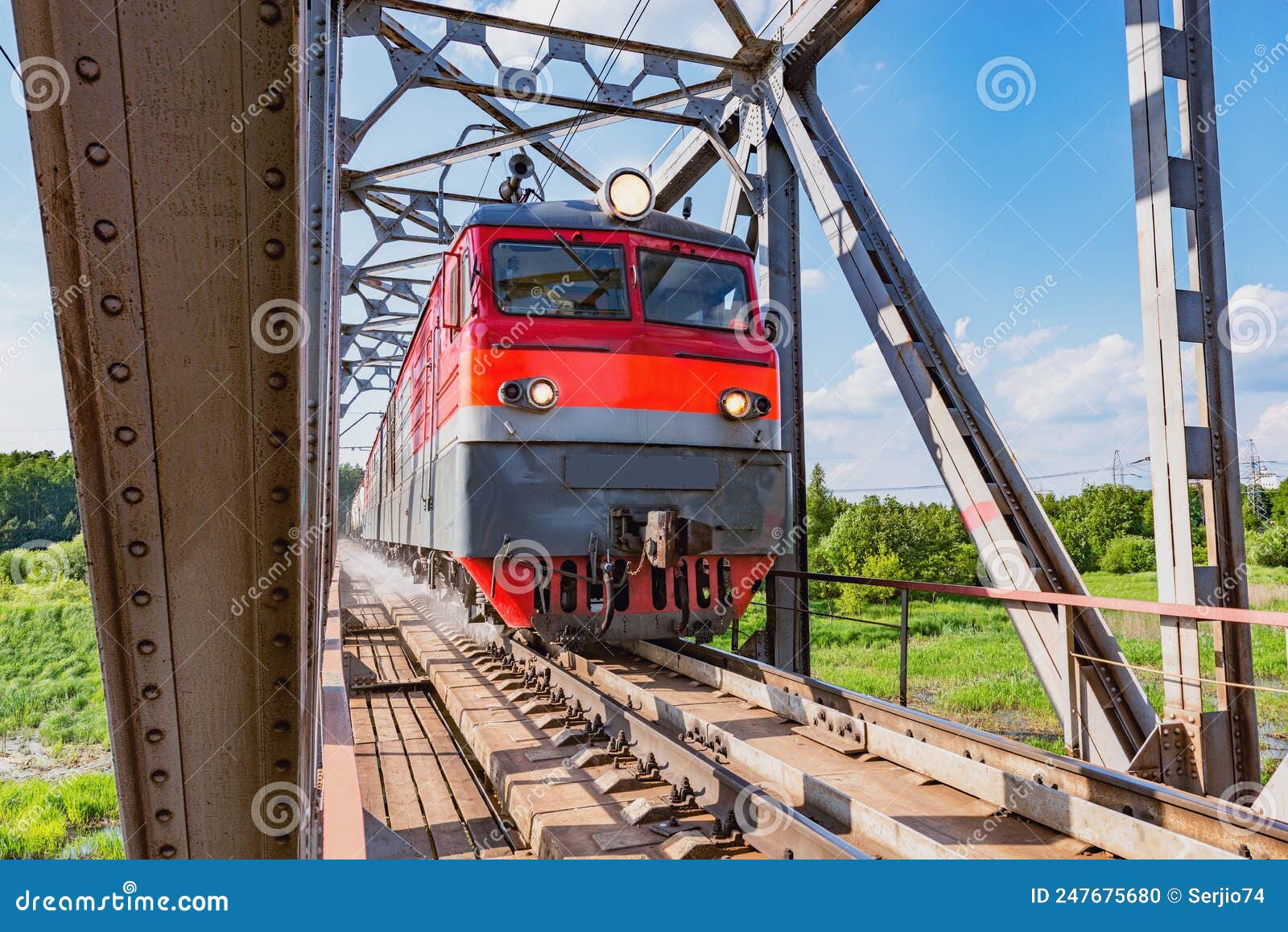 Long Freight Train Approaches Stock Photo Image of track, arrive