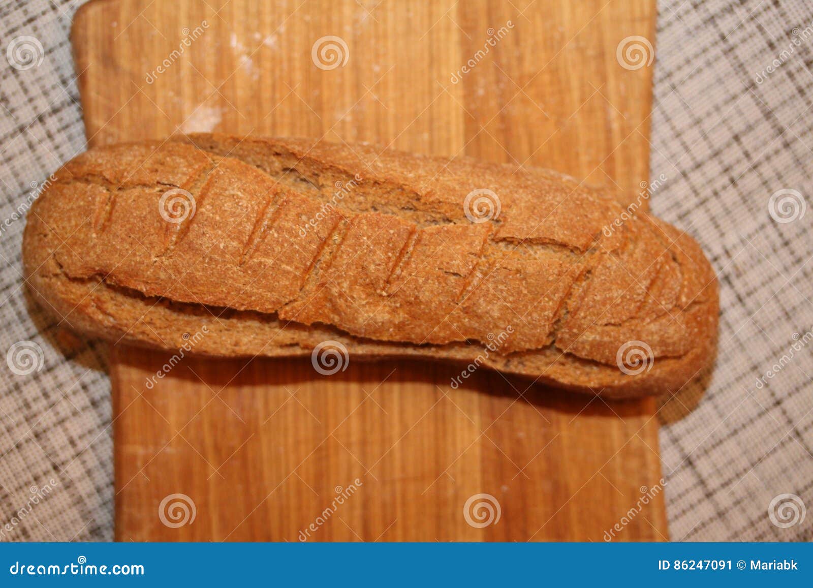 Long French Bread on the Cutting Board. Stock Image Image of cuisine