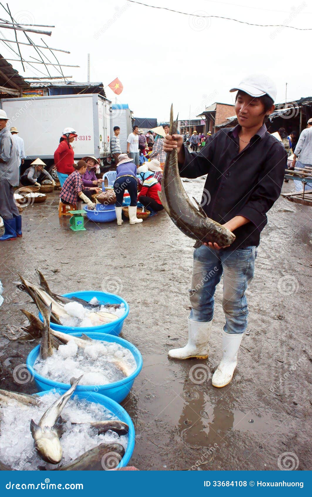 The Man Hold Big Fish at Fishing Market. LONG HAI, Editorial Stock Photo - Image of fishes, fishmarket: 33684108 The Man Hold Big Fish at Fishing Market. LONG HAI, Editorial Stock Photo - Image of fishes, fishmarket: 33684108