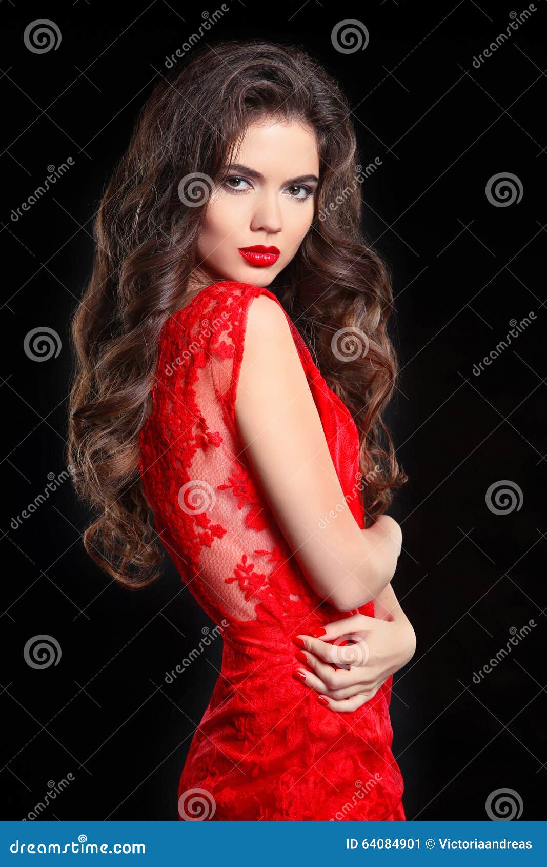 Long Hair. Beautiful Brunette Woman In Red Lace Dress 