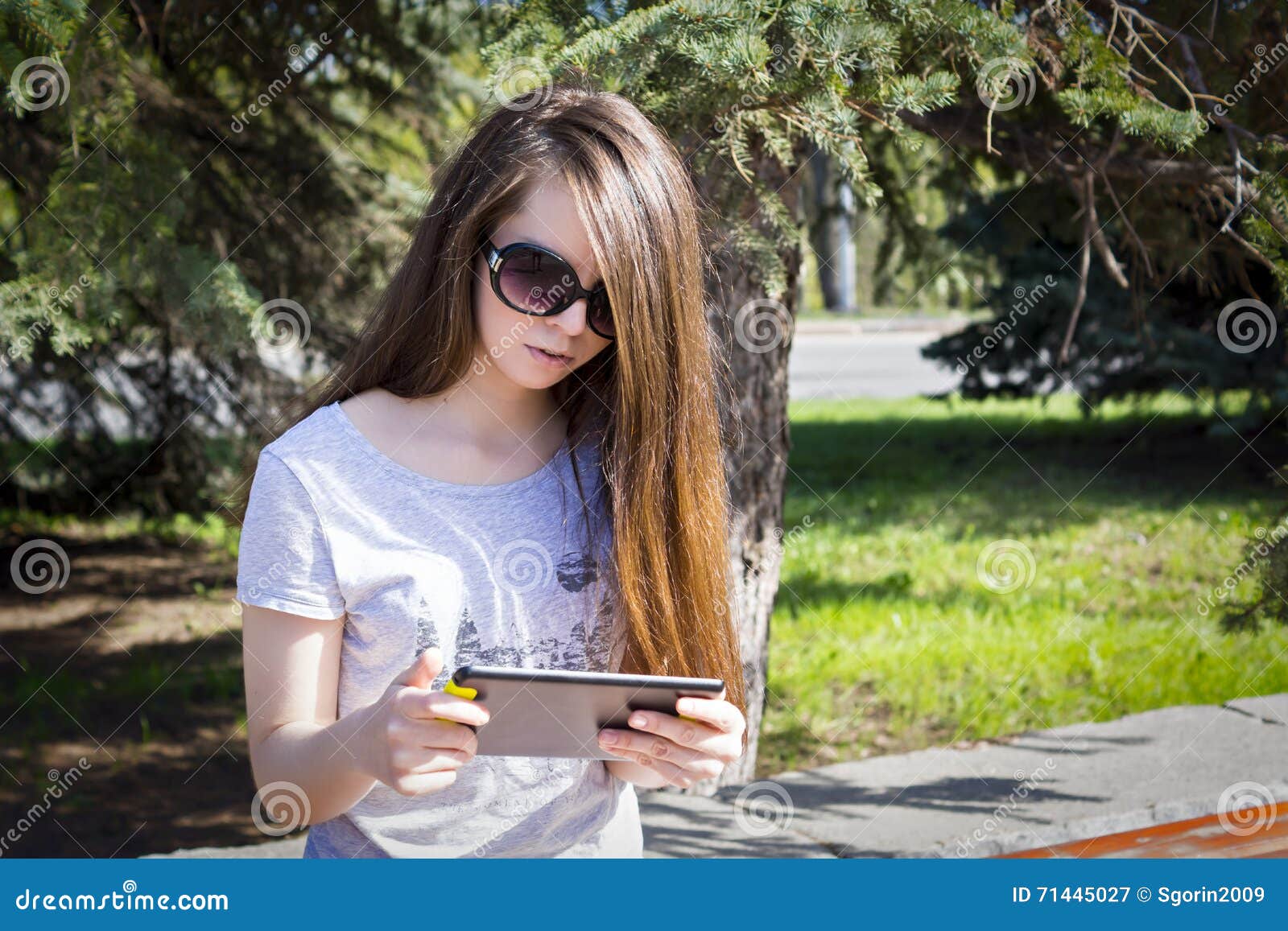 Long Haired Girl Enjoys The Tablet Stock Image Image Of Hair Online 71445027