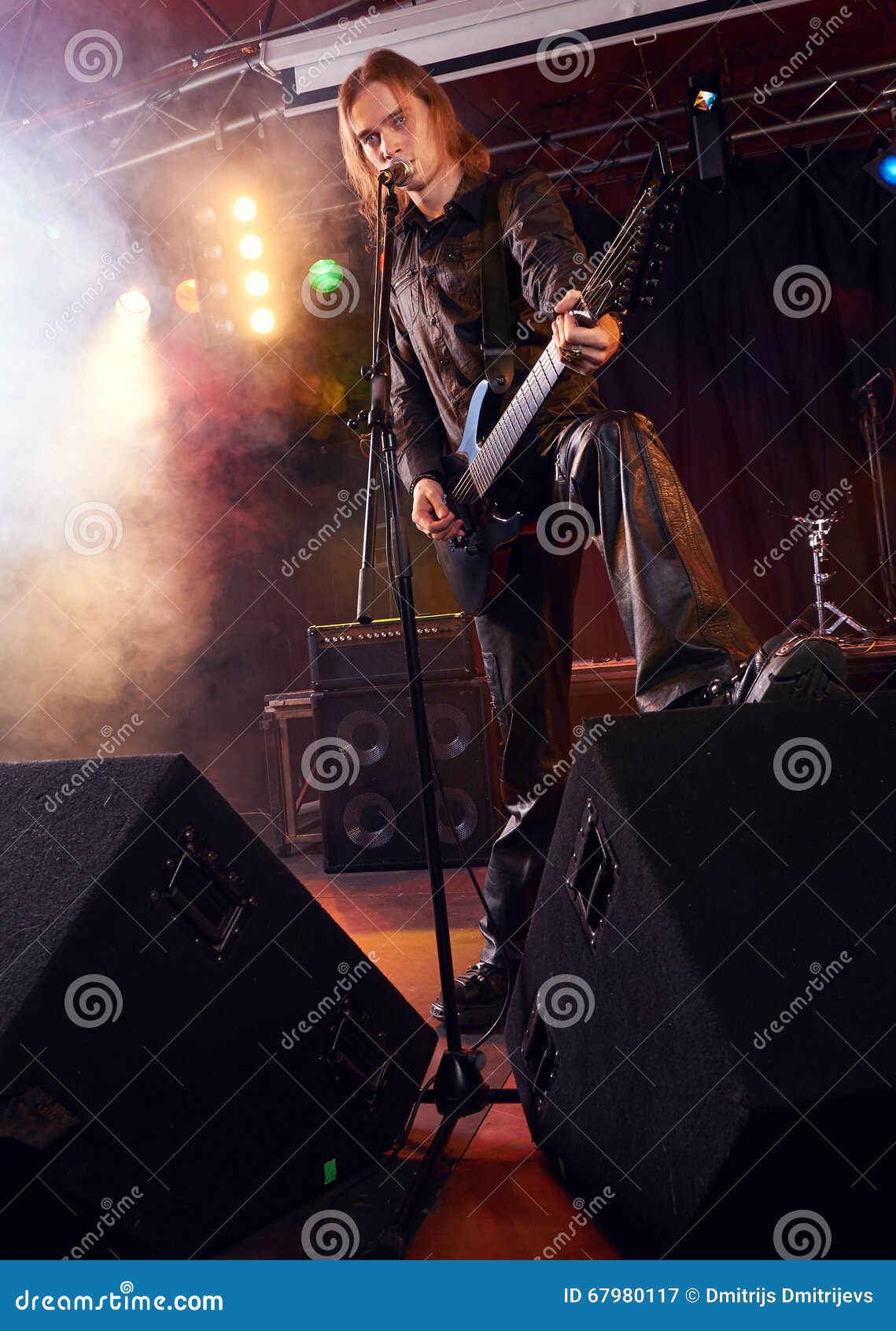 Long Haired Guitarist is Playing and Singing Stock Image Image of
