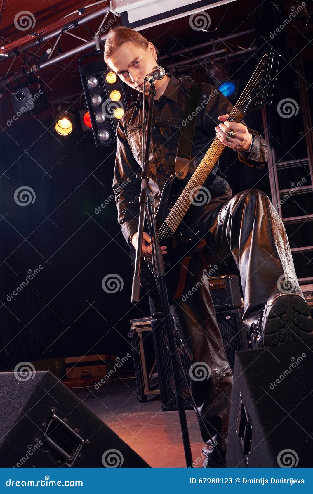 Long Haired Guitarist is Playing and Singing Stock Image Image of